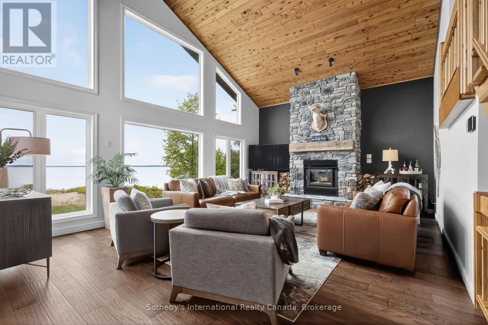 1773 Champlain Road, Tiny, ON - Indoor Photo Showing Living Room With Fireplace