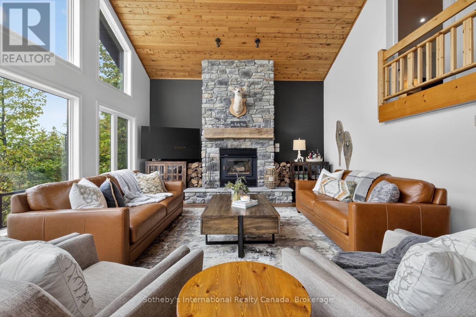 1773 Champlain Road, Tiny, ON - Indoor Photo Showing Living Room With Fireplace
