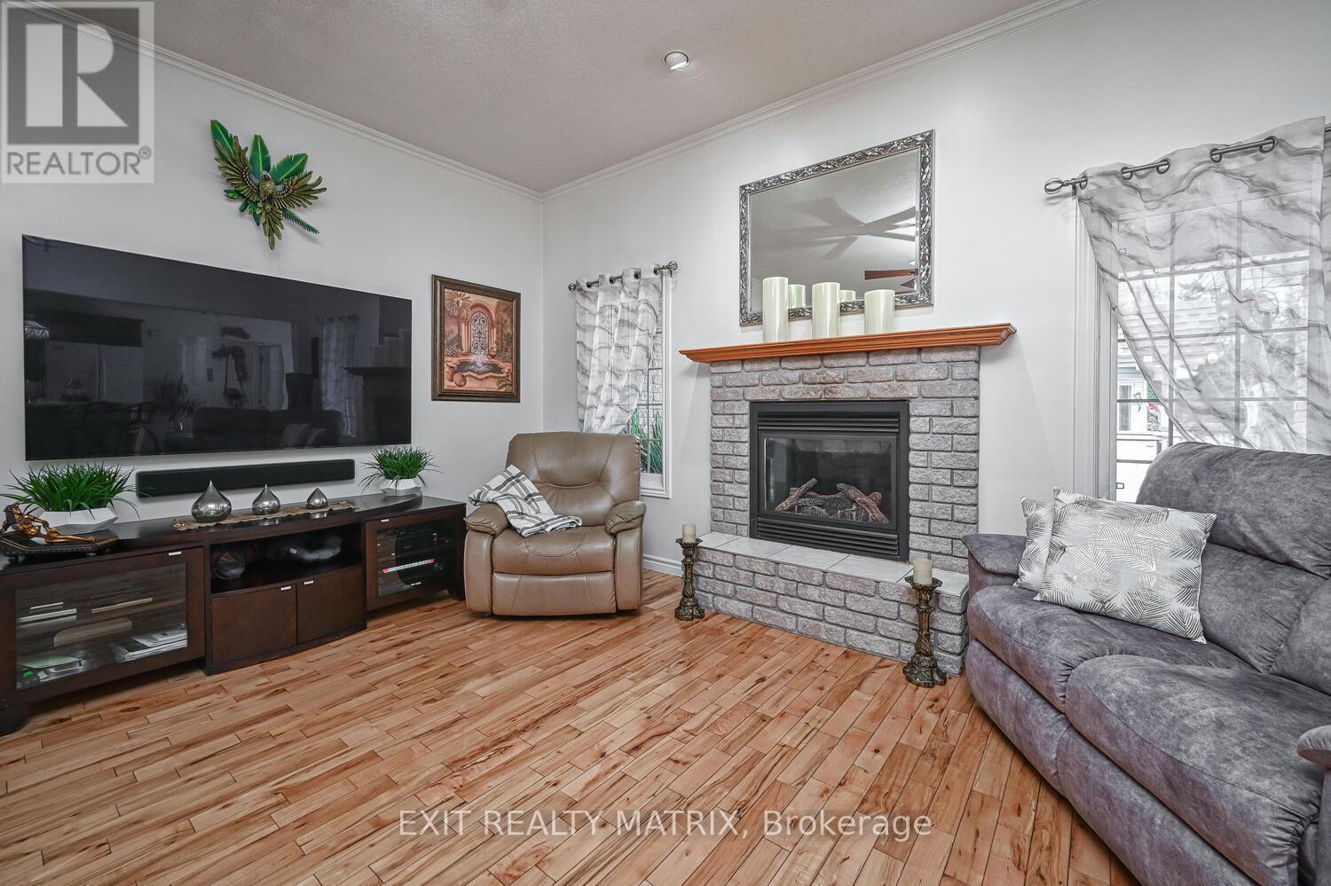 2573 Mitchell Street, Ottawa, ON - Indoor Photo Showing Living Room With Fireplace