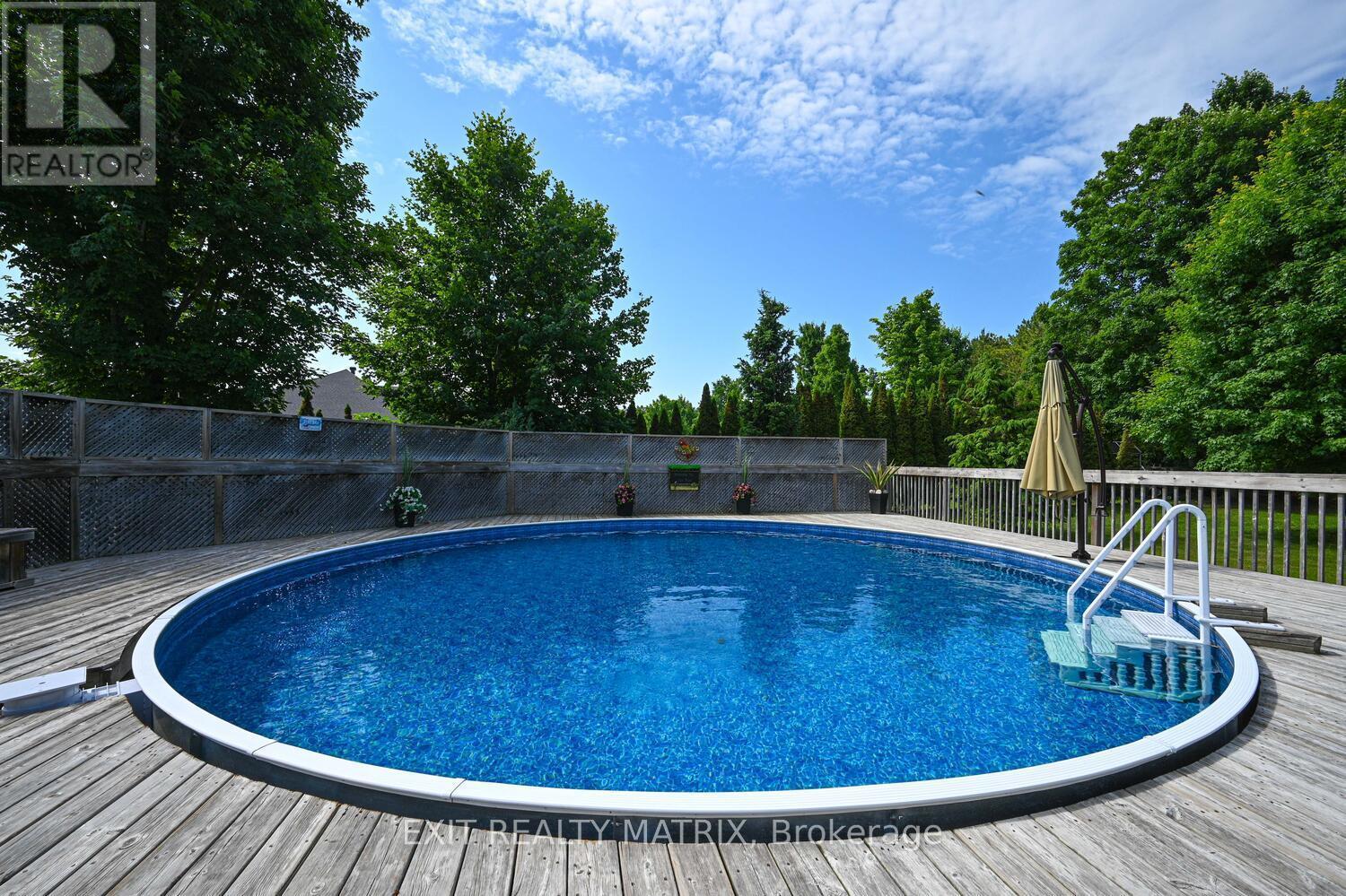 2573 Mitchell Street, Ottawa, ON - Outdoor With Above Ground Pool With Deck Patio Veranda With Backyard