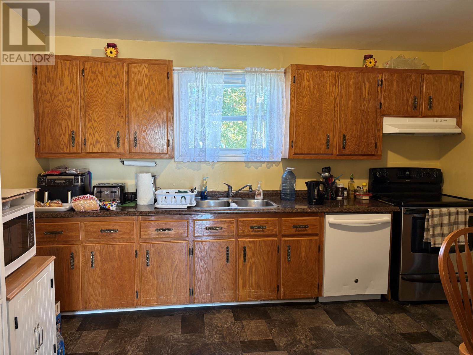 37 St. George'S Avenue, Stephenville, NL - Indoor Photo Showing Kitchen With Double Sink