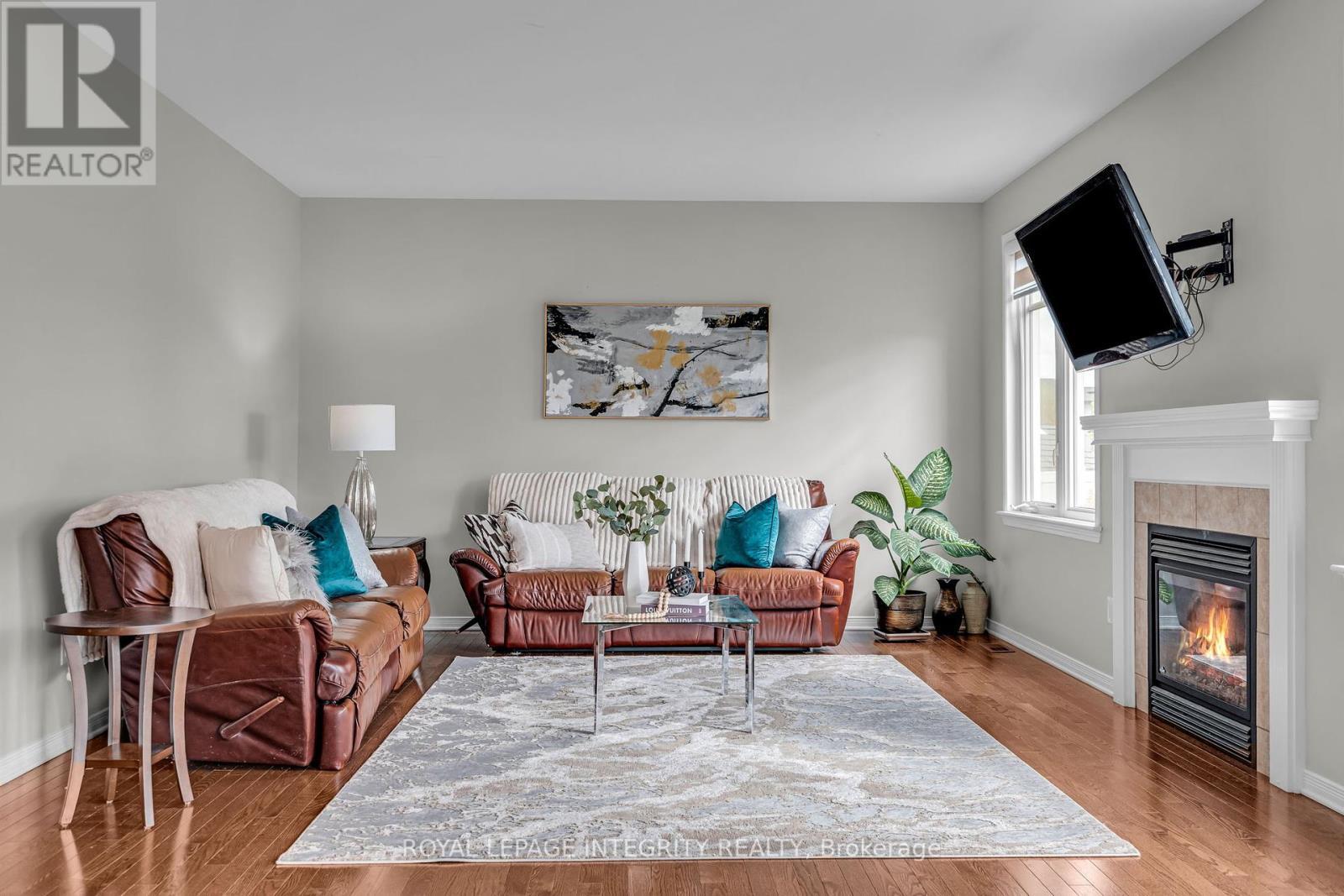 Family room - 367 Andalusian Crescent, Ottawa, ON - Indoor Photo Showing Living Room With Fireplace