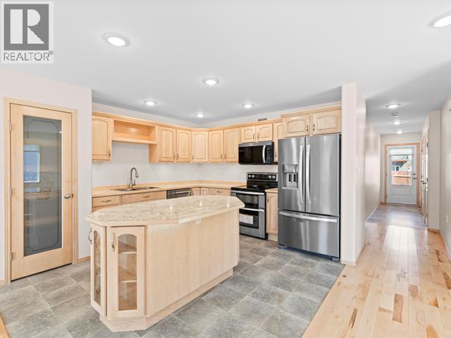 214 Witch Hazel Drive, Whitehorse, YT - Indoor Photo Showing Kitchen With Double Sink