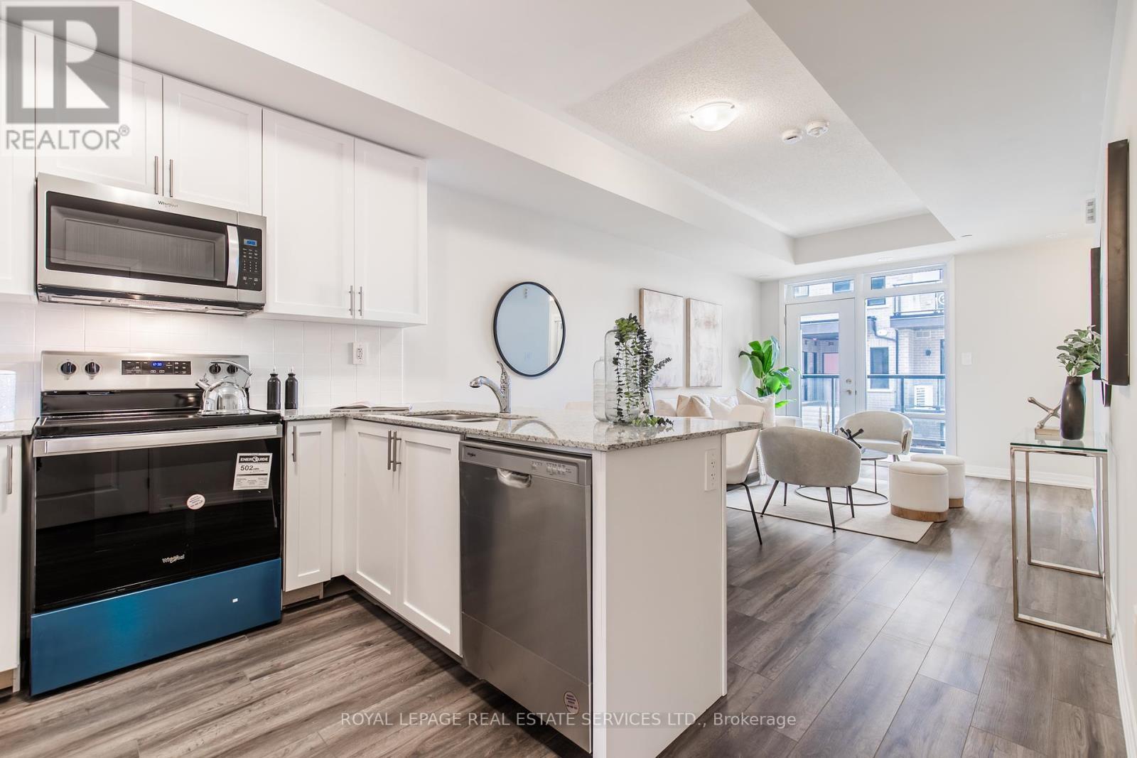 112 - 1597 Rose Way, Milton, ON - Indoor Photo Showing Kitchen