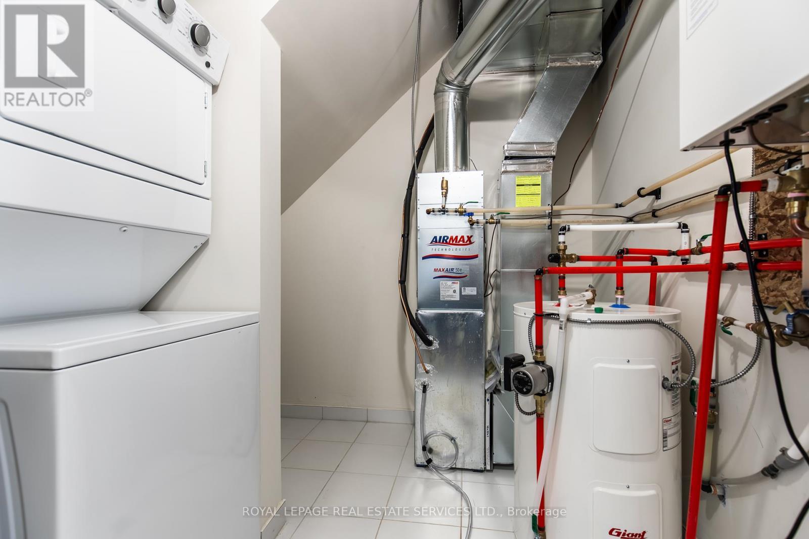112 - 1597 Rose Way, Milton, ON - Indoor Photo Showing Laundry Room
