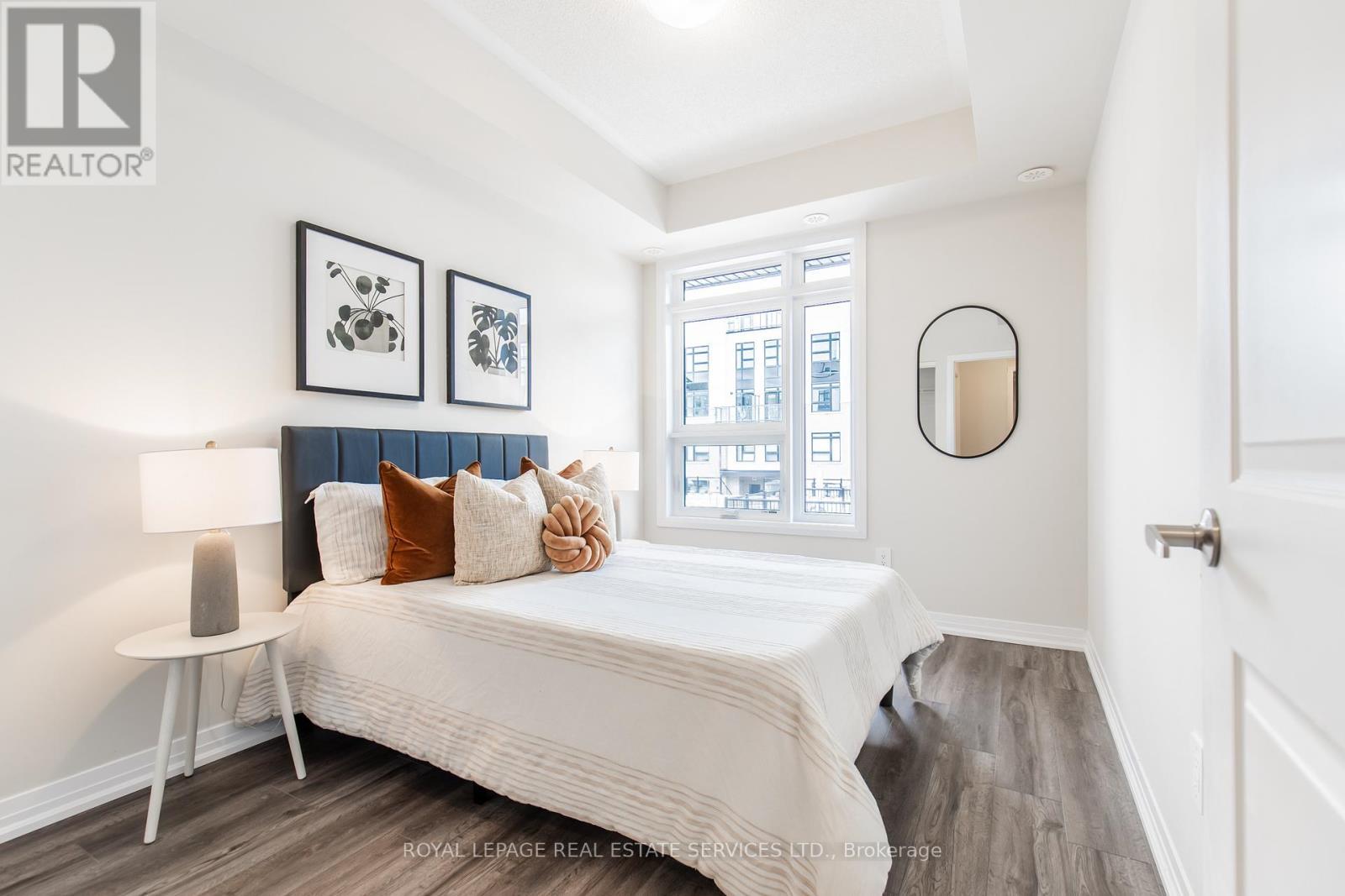 112 - 1597 Rose Way, Milton, ON - Indoor Photo Showing Bedroom