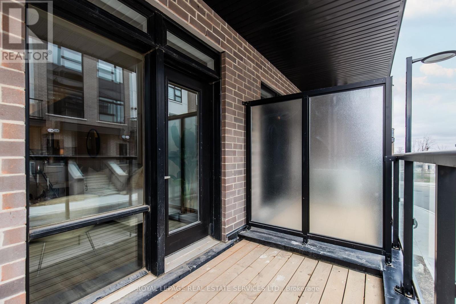 112 - 1597 Rose Way, Milton, ON - Outdoor With Balcony With Exterior