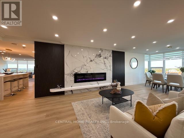 Slab around fireplace - 1707 - 55 Skymark Drive, Toronto, ON - Indoor Photo Showing Living Room With Fireplace