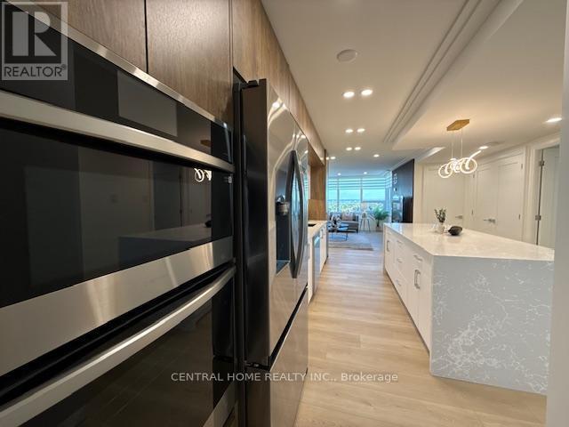 wall Oven and Microwave - 1707 - 55 Skymark Drive, Toronto, ON - Indoor Photo Showing Other Room