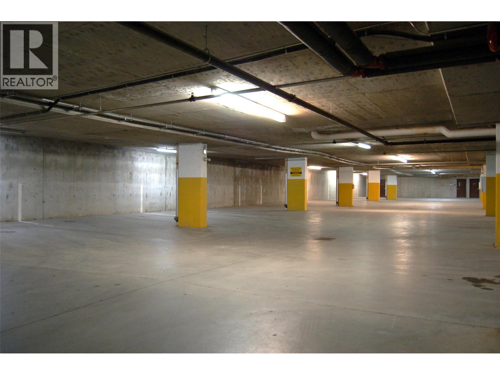 P2 Parking Garage - 5340 Big White Road Unit# 328, Big White, BC - Indoor Photo Showing Garage