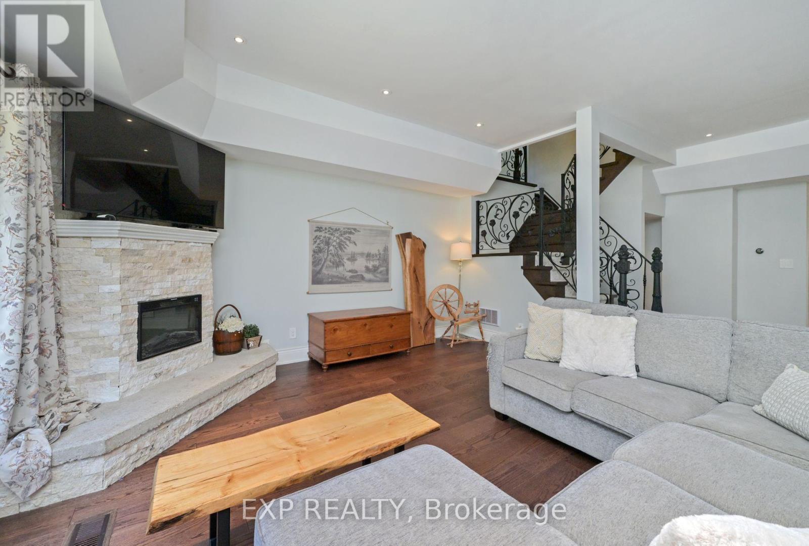 12 Mill Street, Amaranth, ON - Indoor Photo Showing Living Room With Fireplace