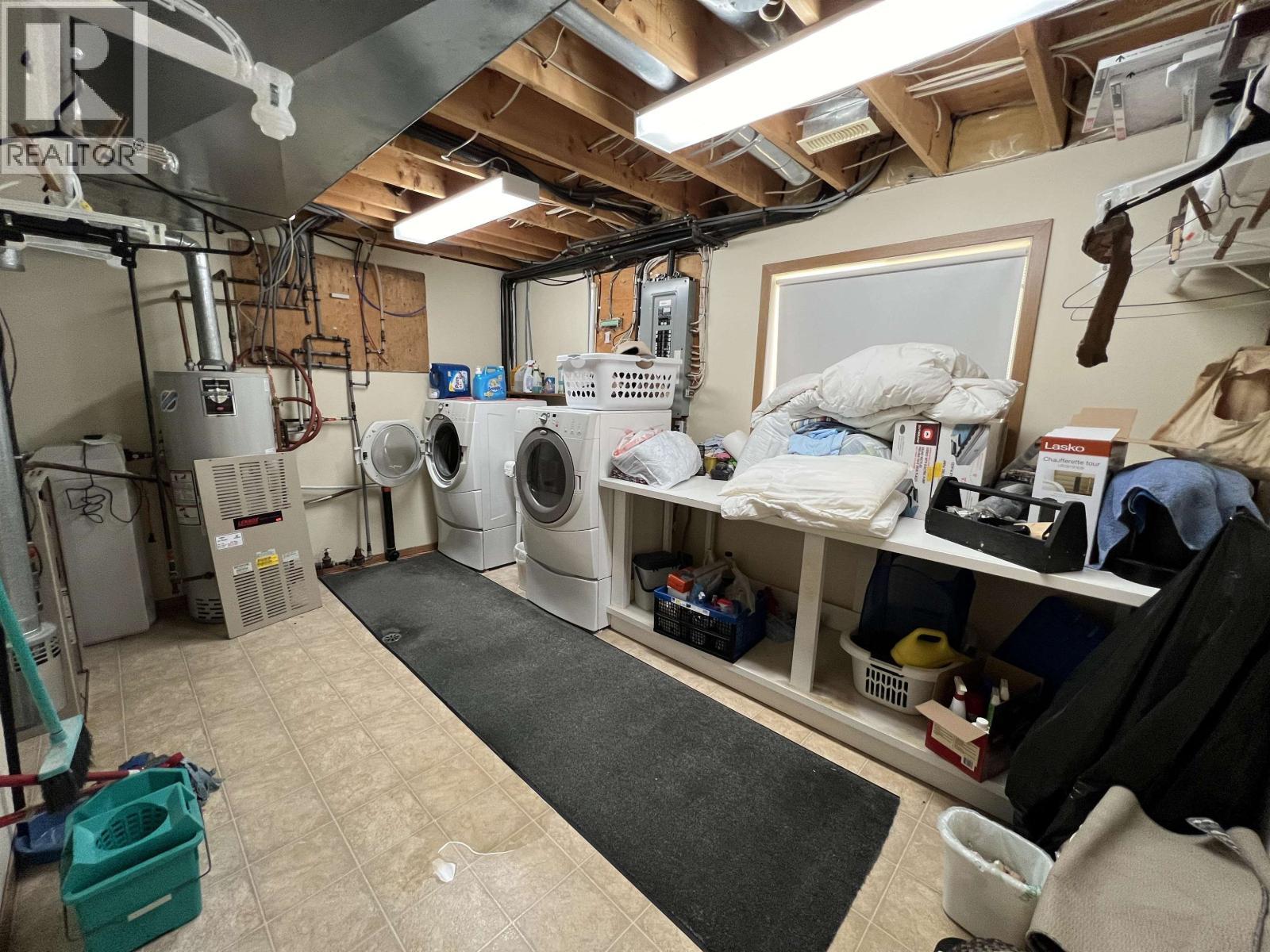 3 Pebble Drive, Fort Nelson, BC - Indoor Photo Showing Laundry Room