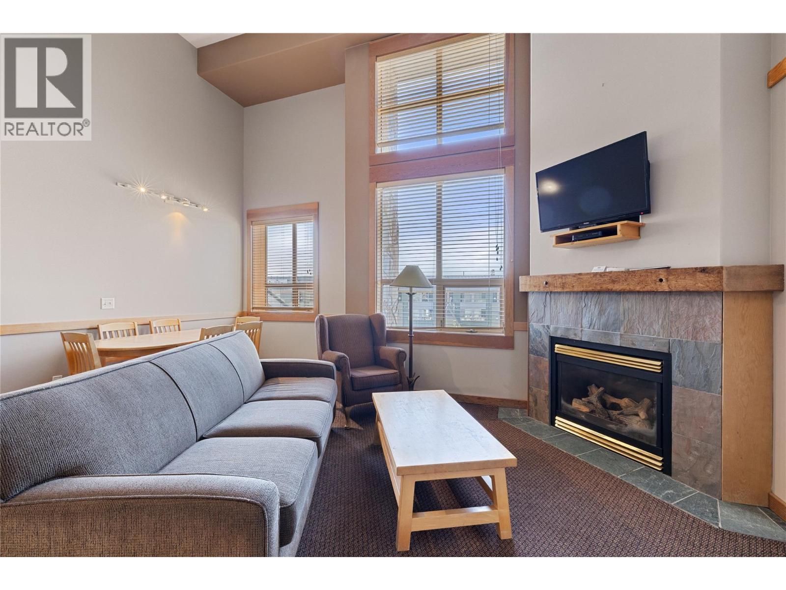 5335 Big White Road Unit# 206, Big White, BC - Indoor Photo Showing Living Room With Fireplace