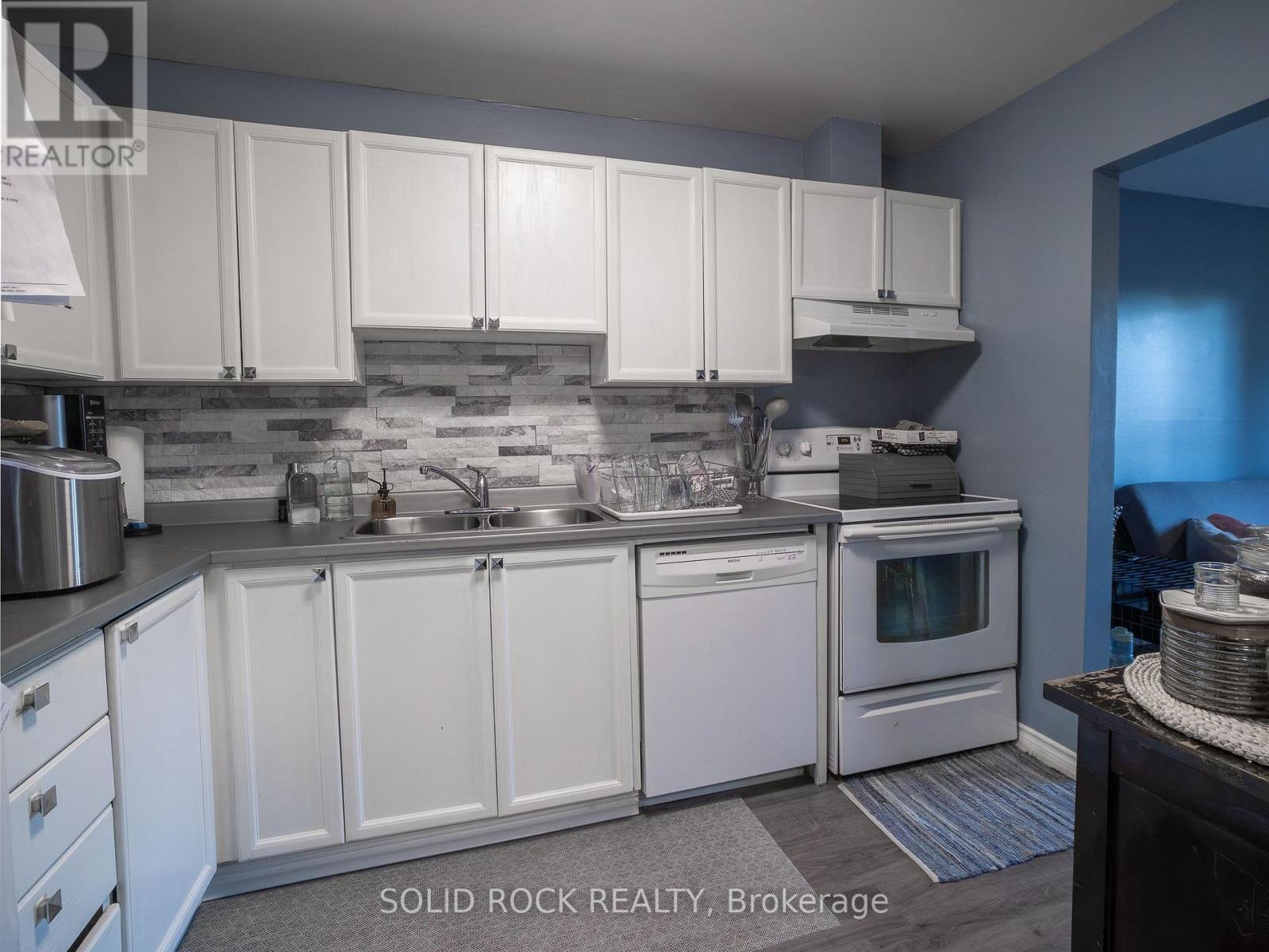 106 - 24 Townline Road W, Carleton Place, ON - Indoor Photo Showing Kitchen With Double Sink