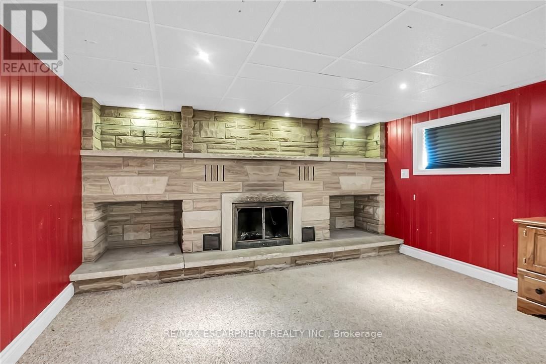 180 West Side Road, Port Colborne, ON - Indoor Photo Showing Other Room With Fireplace