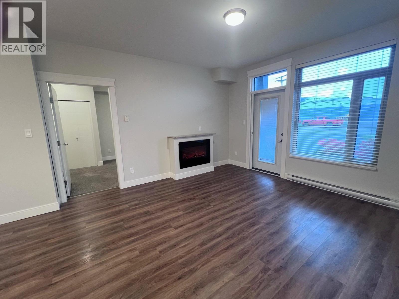 105 3684 Princess Crescent, Smithers, BC - Indoor With Fireplace