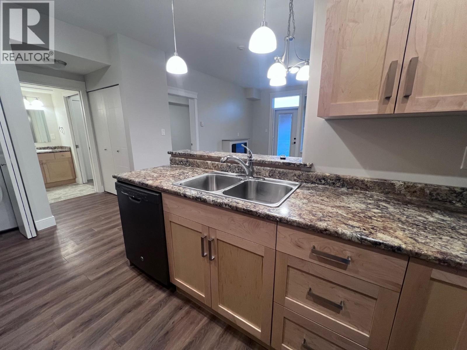 105 3684 Princess Crescent, Smithers, BC - Indoor Photo Showing Kitchen With Double Sink