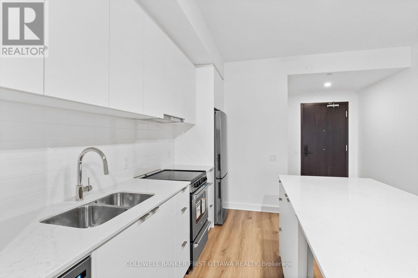 410 - 115 Echo Drive, Ottawa, ON - Indoor Photo Showing Kitchen With Double Sink