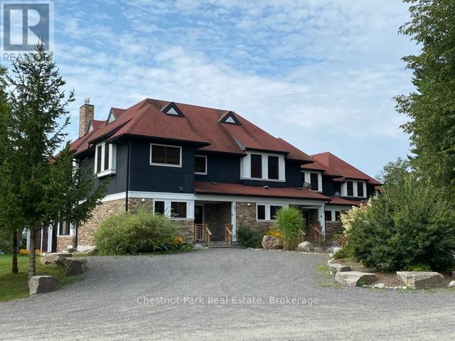 C5 12Sa & 12Sc - 1003 Matthews Drive, Muskoka Lakes (Watt), ON - Outdoor With Facade