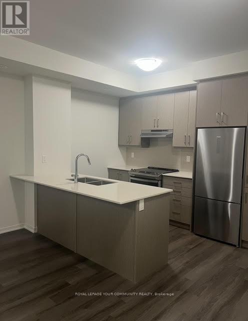 Th262 - 150 Honeycrisp Crescent, Vaughan, ON - Indoor Photo Showing Kitchen With Stainless Steel Kitchen With Double Sink With Upgraded Kitchen