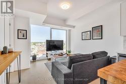 Living Room with Floor to Ceiling Windows -
