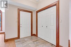 Foyer ceramic floor,, oak trim & double closet -
