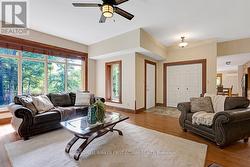 Large windows overlook tranquil outdoors -