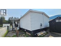 back of home with side deck -