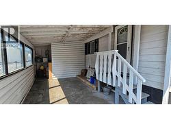 Carport and covered main entranceway -