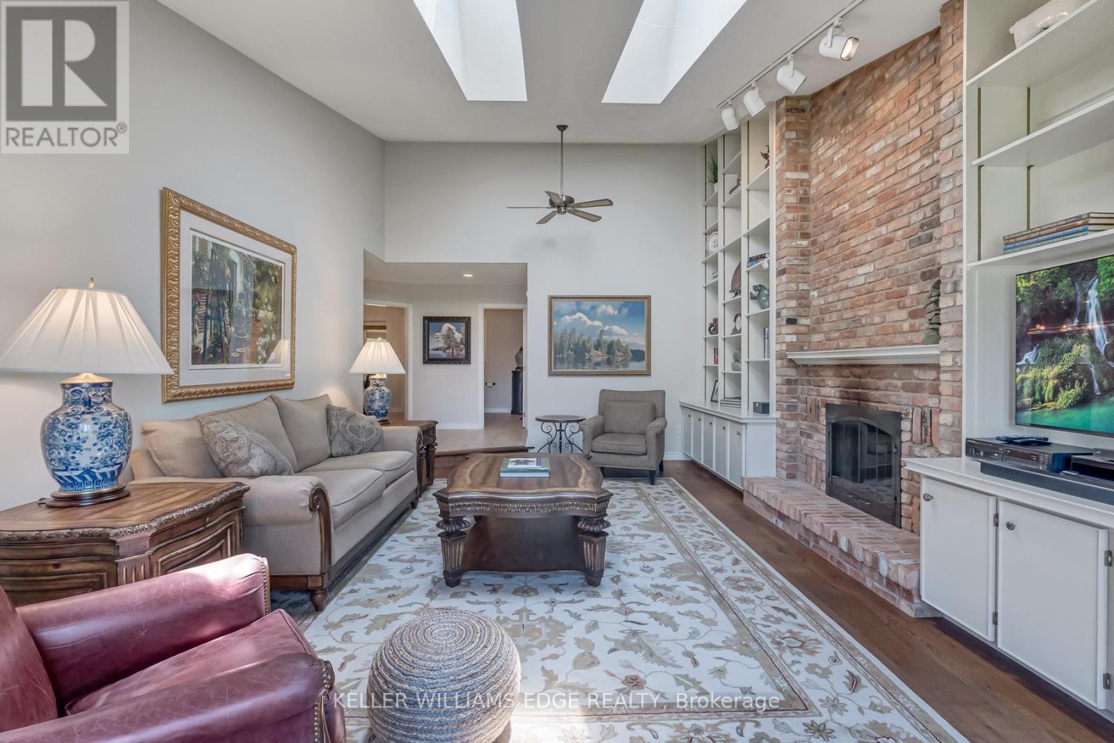 8 Lochside Drive, Hamilton, ON - Indoor Photo Showing Living Room With Fireplace