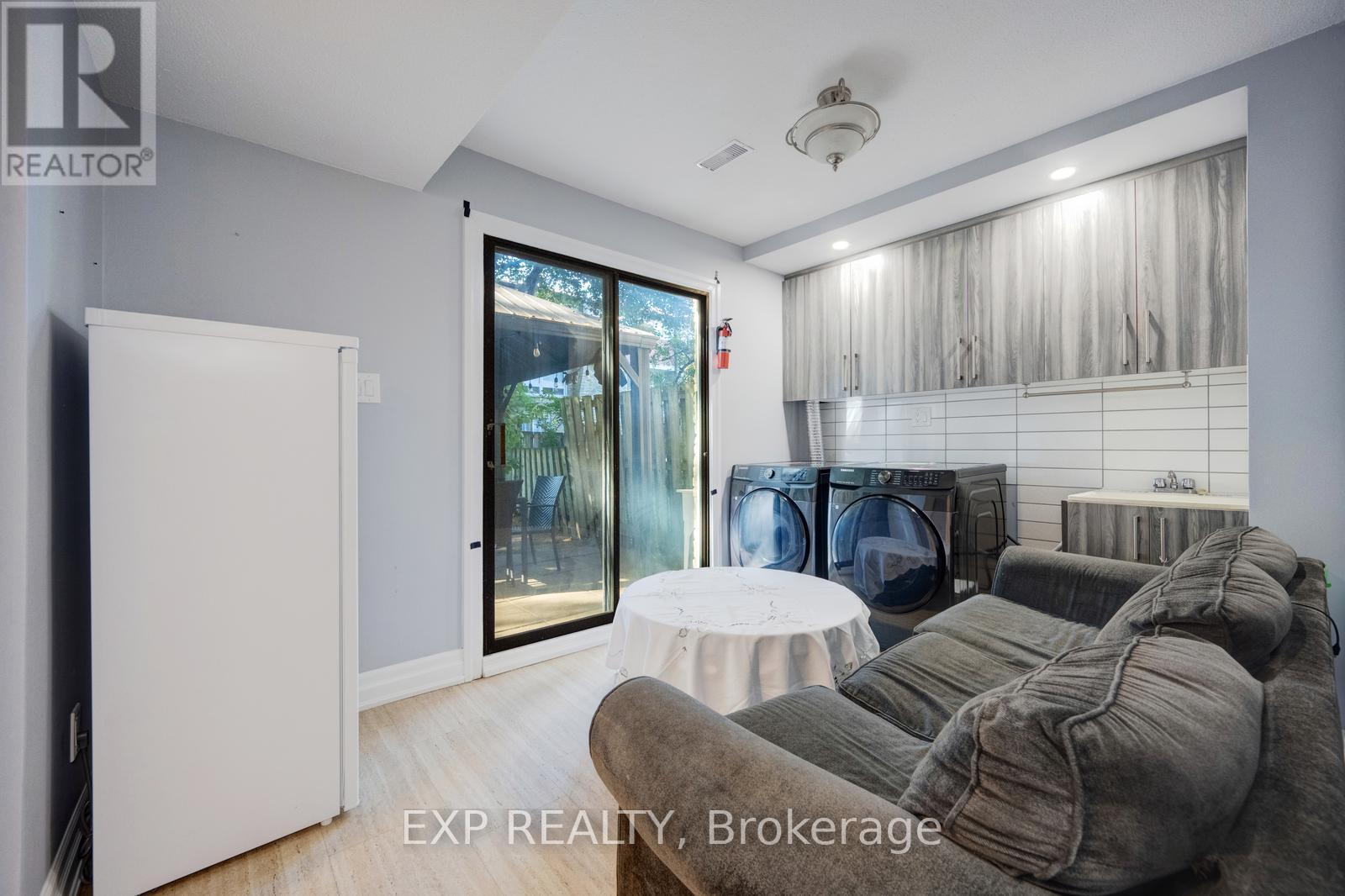 Laundry 1 - Unit 42 - 915 Inverhouse Drive, Mississauga, ON - Indoor With Fireplace