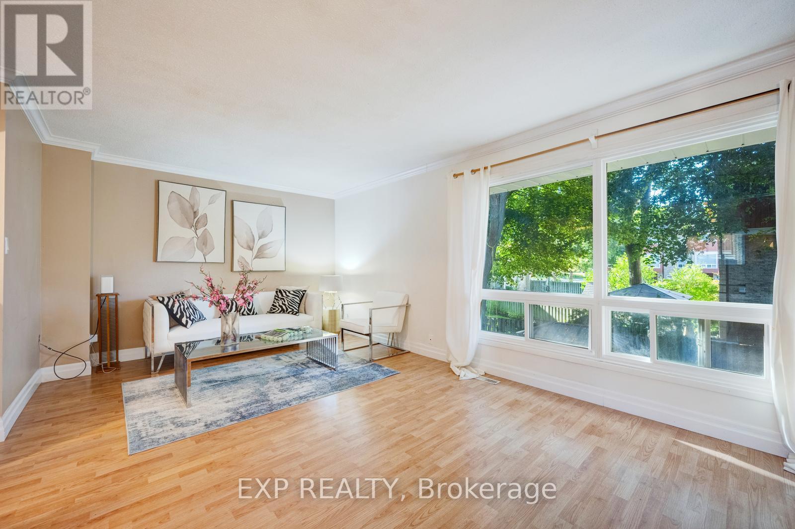 Living 1 - Unit 42 - 915 Inverhouse Drive, Mississauga, ON - Indoor Photo Showing Living Room