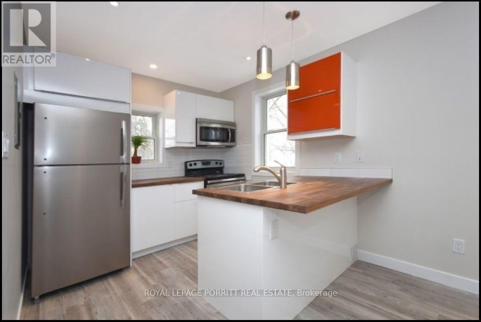 4 - 3411 Lake Shore Boulevard W, Toronto, ON - Indoor Photo Showing Kitchen With Stainless Steel Kitchen With Double Sink