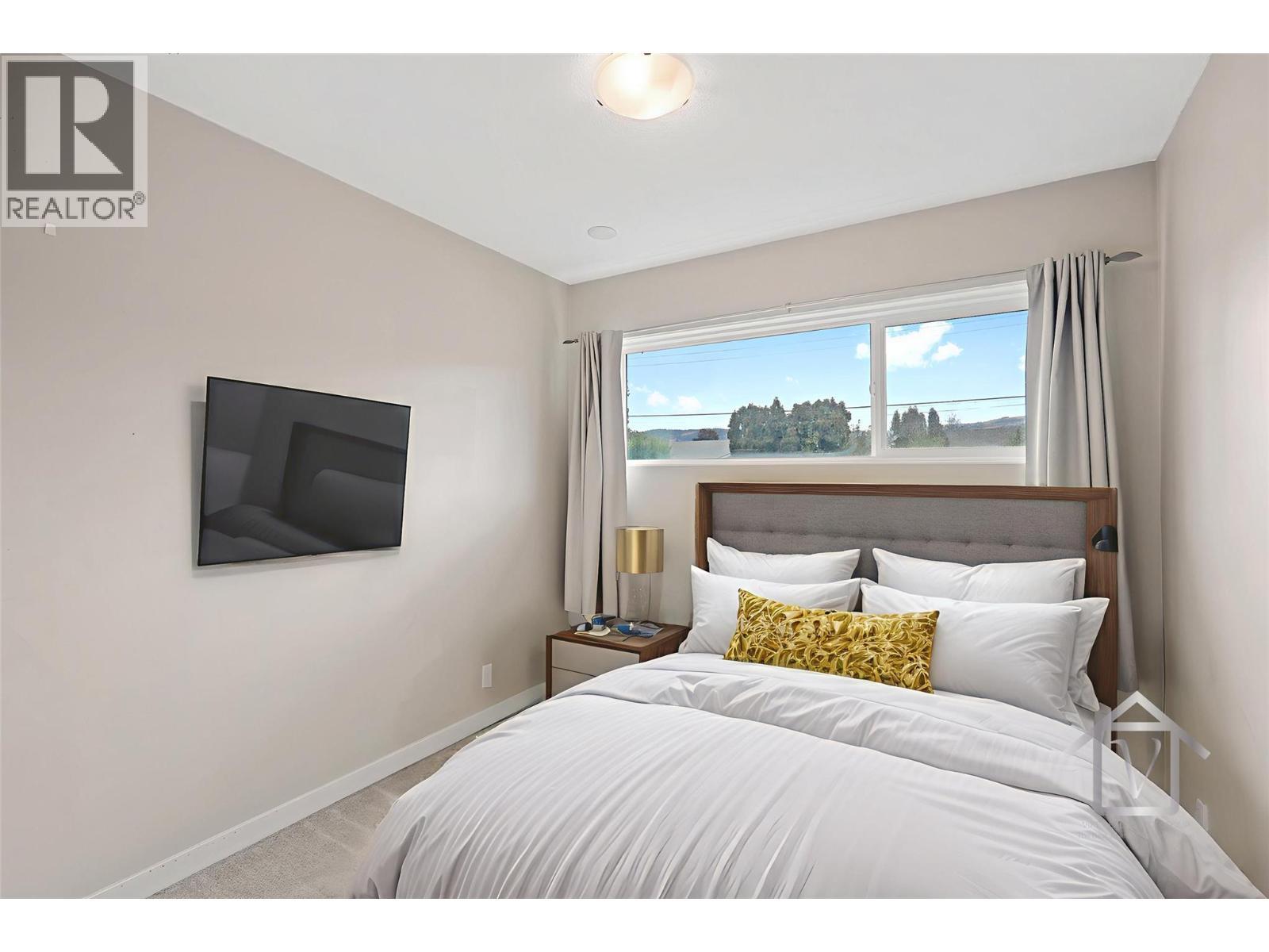 virtually staged - 293 Walnut Avenue, Kamloops, BC - Indoor Photo Showing Bedroom
