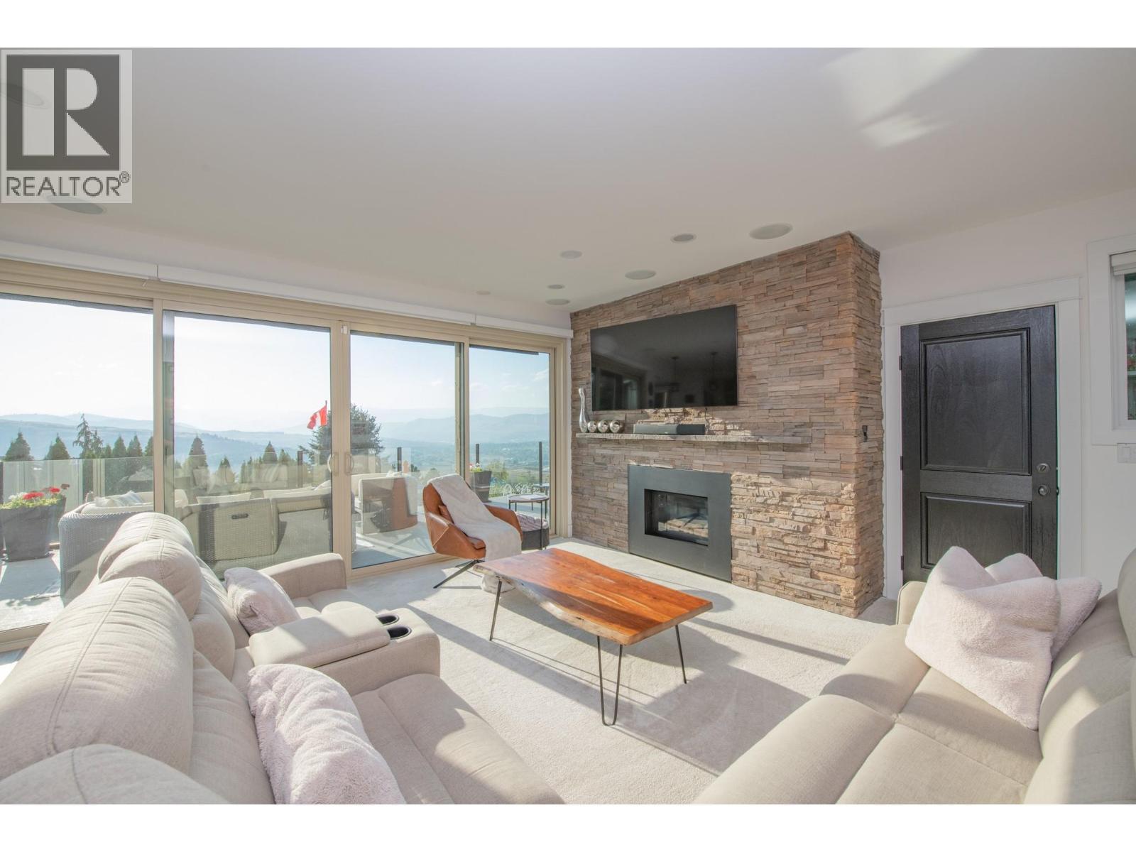 702 Cypress Drive, Coldstream, BC - Indoor Photo Showing Living Room With Fireplace