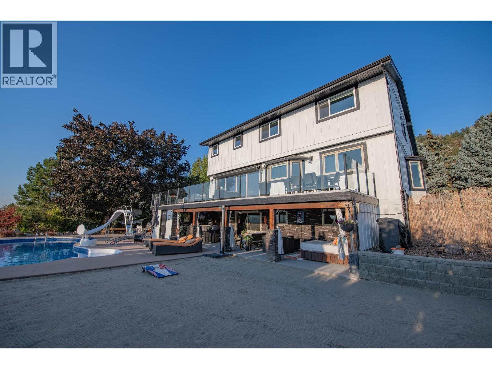 702 Cypress Drive, Coldstream, BC - Outdoor With Deck Patio Veranda