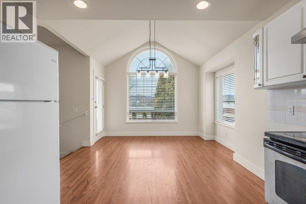 Kitchen flows to dining - 974 Mt. Beaven Place, Vernon, BC - Indoor