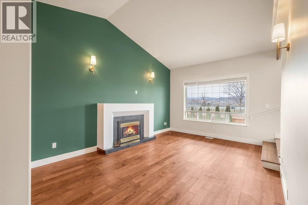 974 Mt. Beaven Place, Vernon, BC - Indoor Photo Showing Living Room With Fireplace