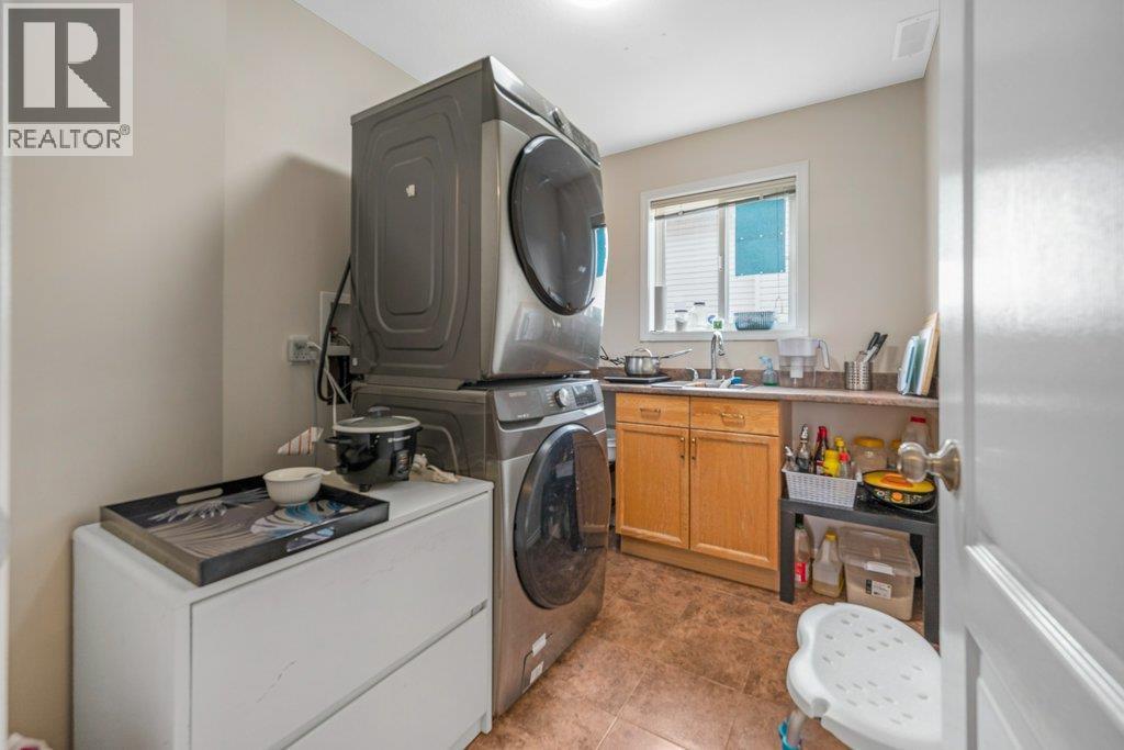 Suite - laundry functioning as kitchen as well - 974 Mt. Beaven Place, Vernon, BC - Indoor Photo Showing Laundry Room