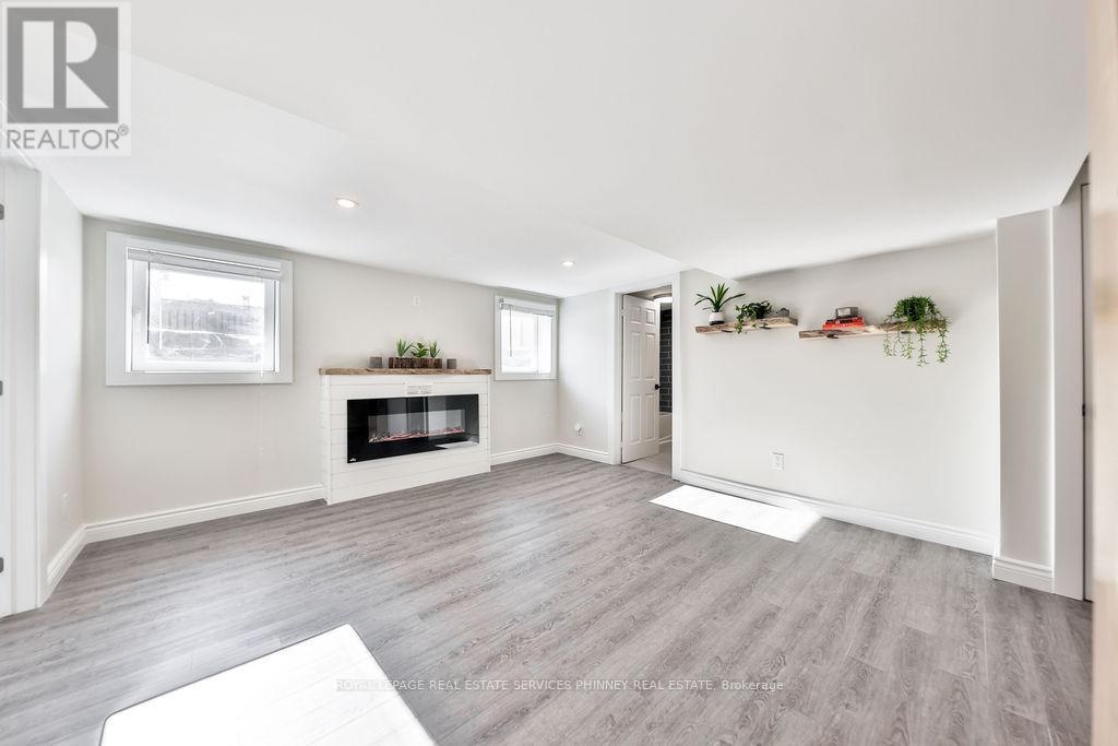 47 Castlefield Drive, Hamilton, ON - Indoor Photo Showing Living Room With Fireplace