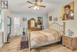 Primary bedroom with door out to back deck -