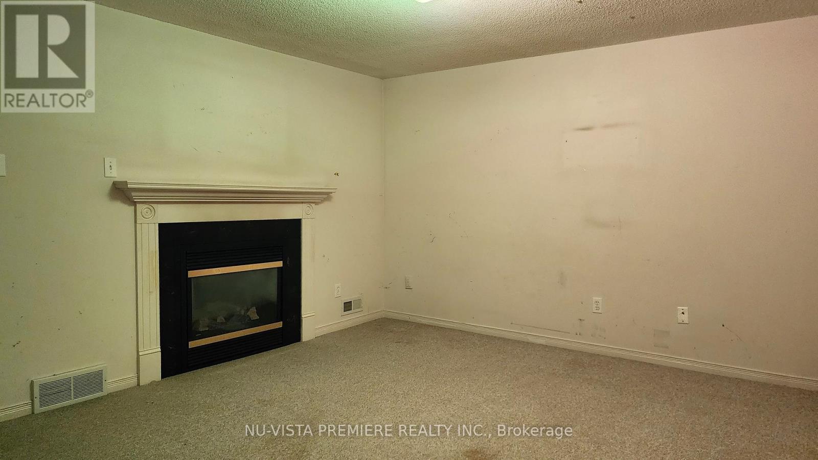 7 - 40 Burslem Street, London East (East N), ON - Indoor With Fireplace