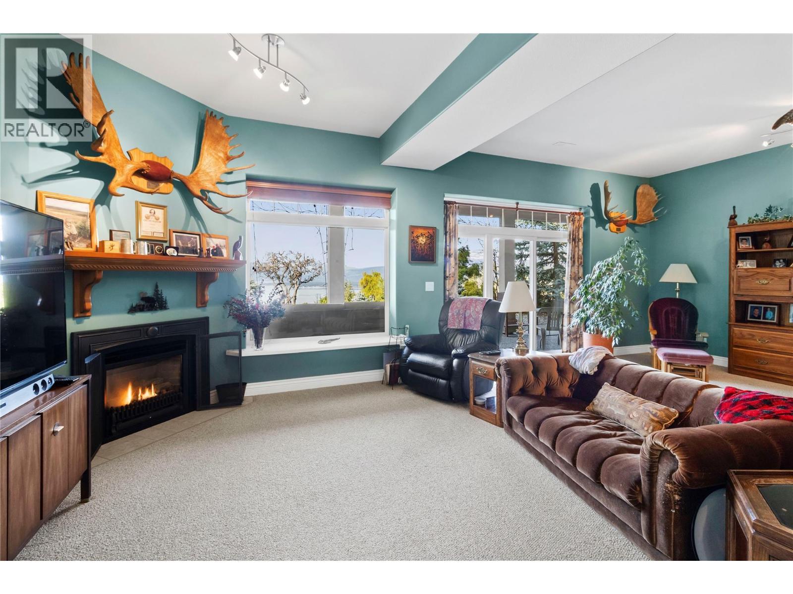 3676 Mcbride Road, Blind Bay, BC - Indoor Photo Showing Living Room With Fireplace