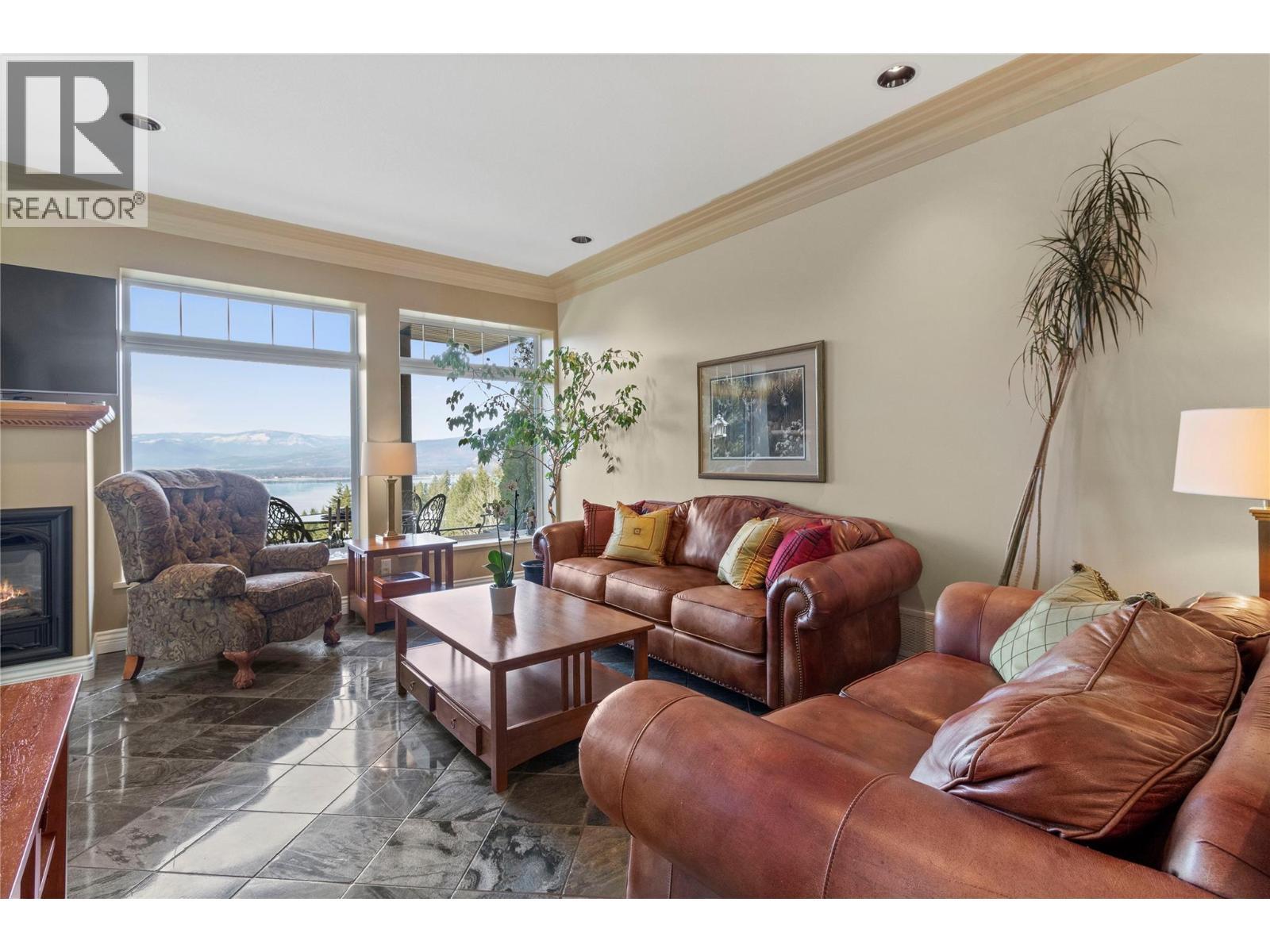 3676 Mcbride Road, Blind Bay, BC - Indoor Photo Showing Living Room With Fireplace