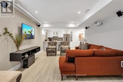 Lower level rec room with projector, screen -