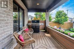 Covered deck overlooking the backyard -
