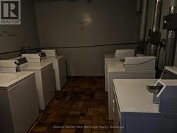 coin laundry in basement -