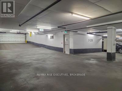 601 - 121 Queen Street, Kingston (East Of Sir John A. Blvd), ON - Indoor Photo Showing Garage