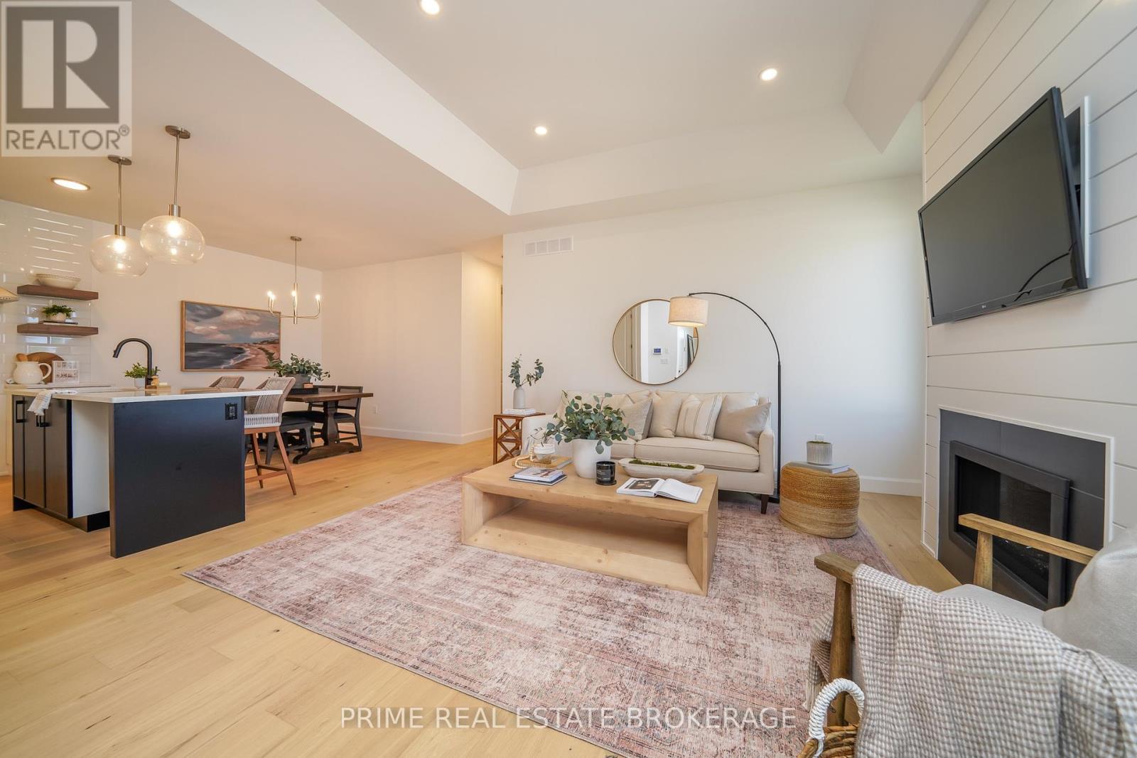 55 - 2 Coastal Crescent, Lambton Shores (Grand Bend), ON - Indoor Photo Showing Other Room With Fireplace