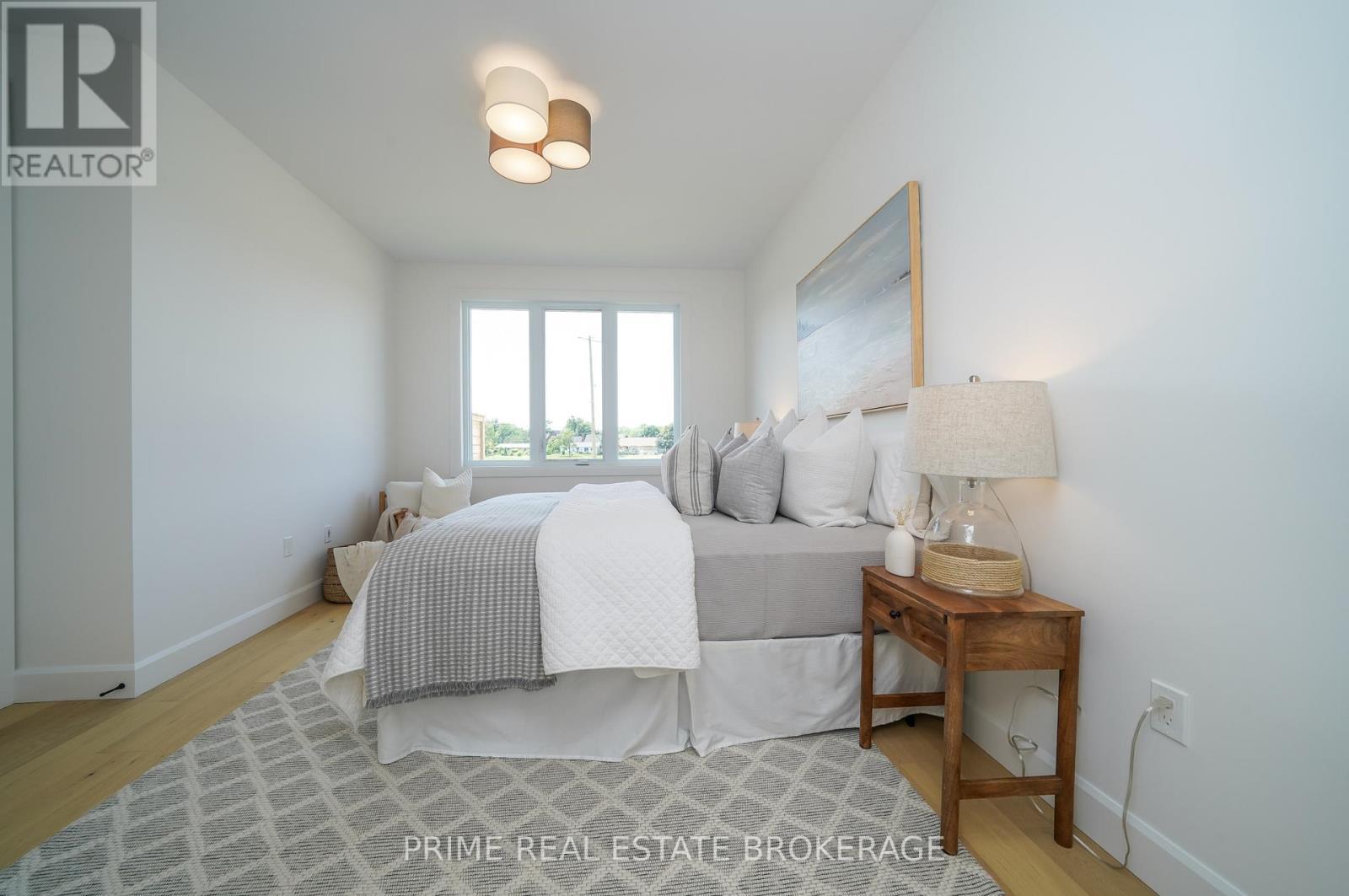 55 - 2 Coastal Crescent, Lambton Shores (Grand Bend), ON - Indoor Photo Showing Bedroom
